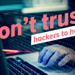 A hands-on business reviewing its IT protection and backup plan on screen, representing keeping a workshop running and avoiding downtime during a cyber attack.